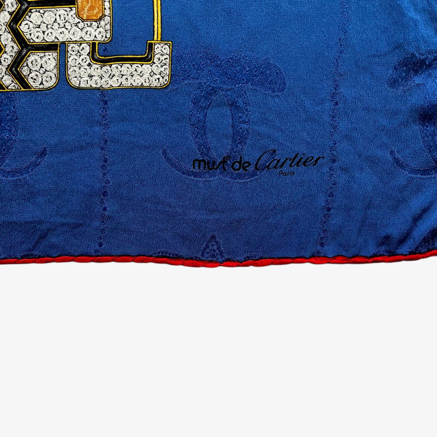 Must de Cartier spell out logo on women's vintage 80s interlocking cc print blue silk scarf with a red jewelled belt trim.