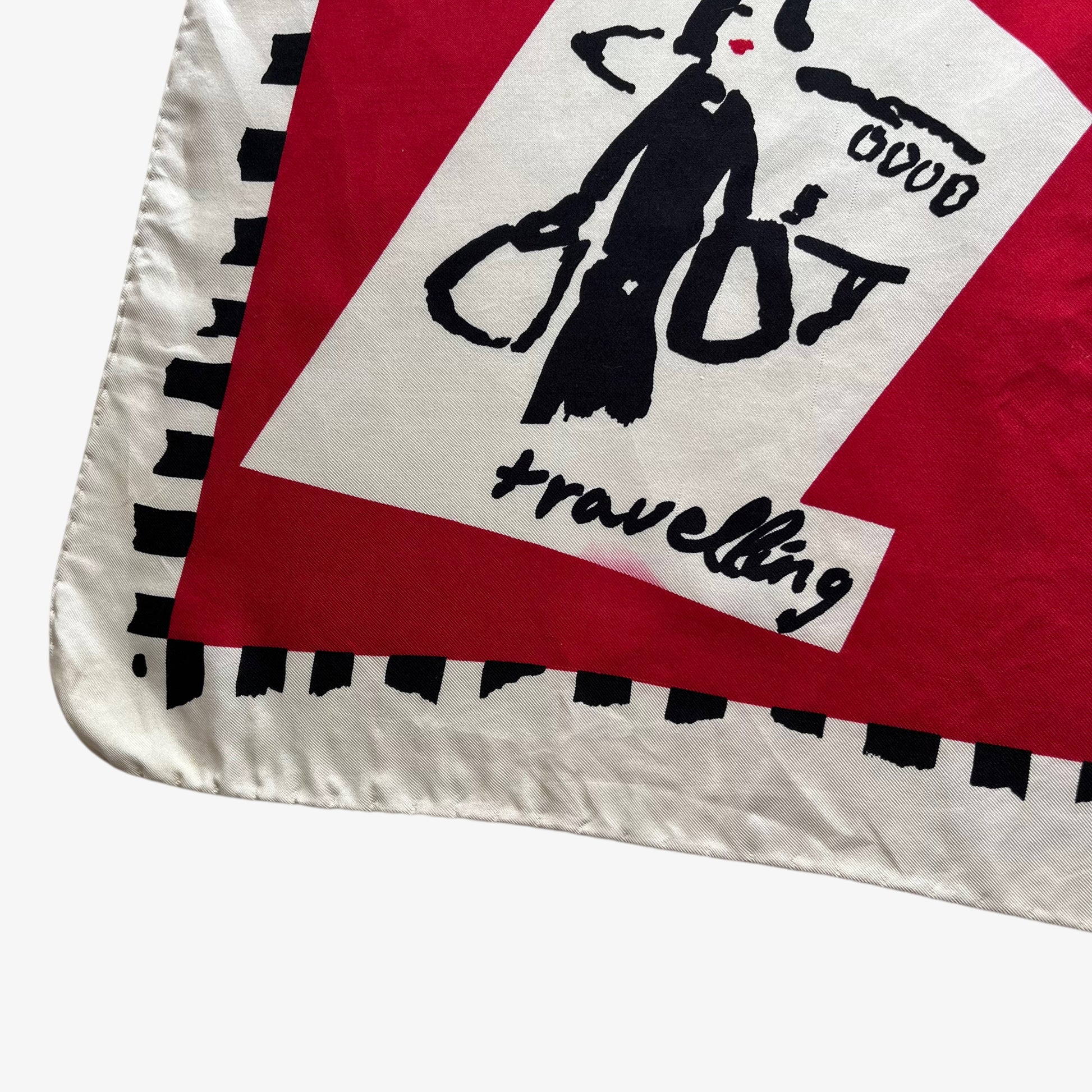 Patina of women's vintage 80s Paloma Picasso red silk scarf featuring the famous a day in the life of a woman design.