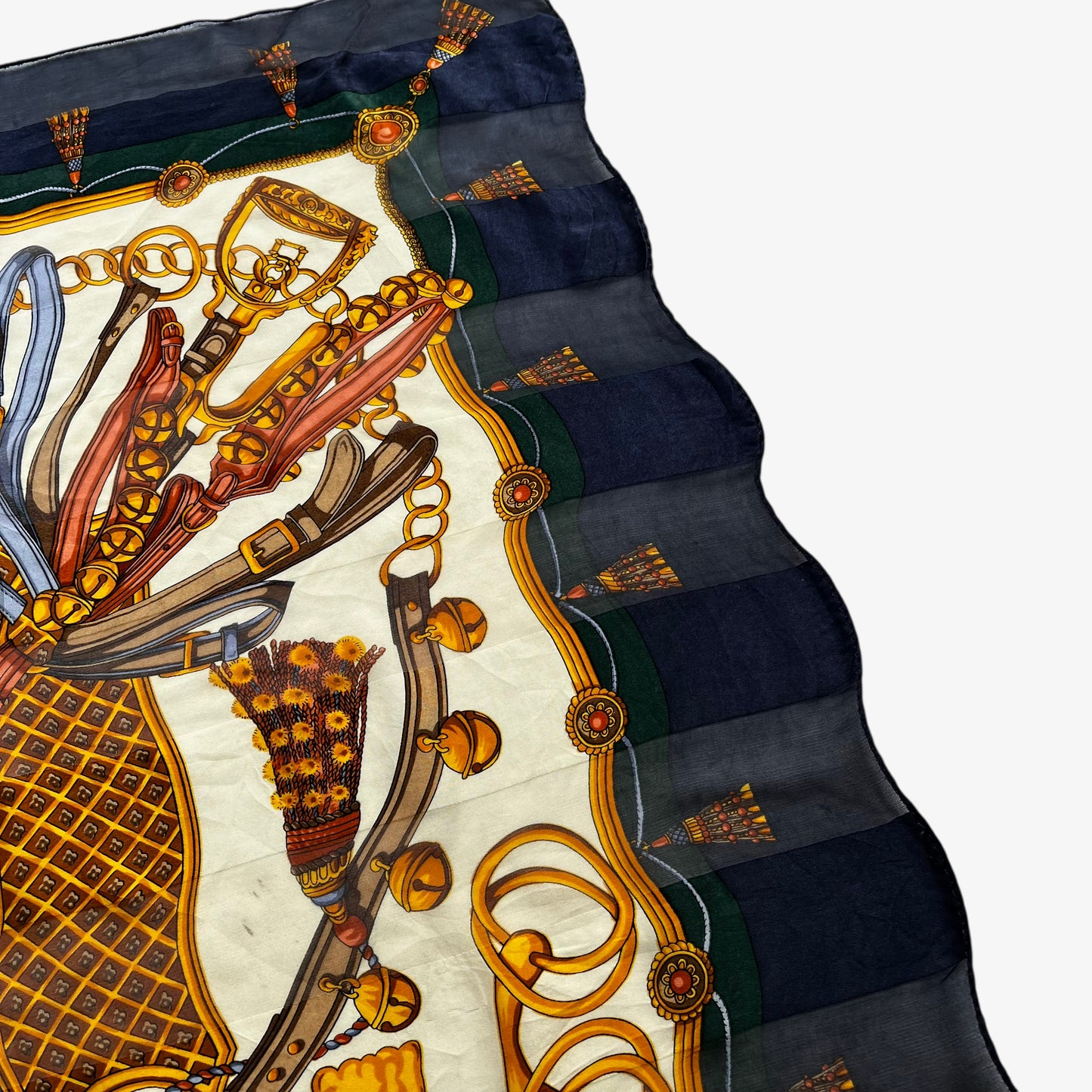 Patina on women's vintage 90s Paolo Gucci equestrian saddle and horsebit print silk scarf.