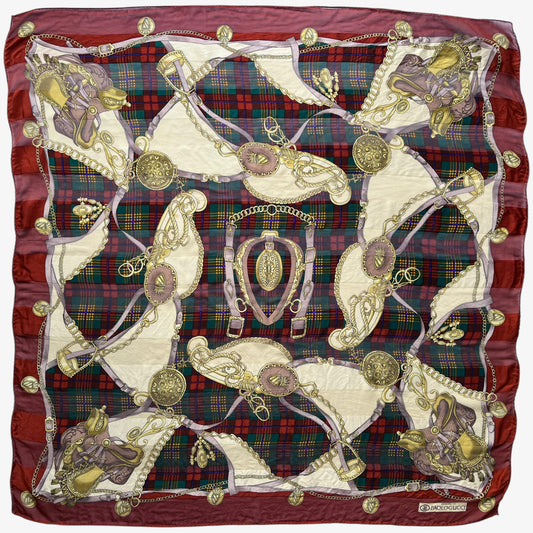 Women's vintage 80s Paolo Gucci equestrian saddle print red silk scarf featuring a green tartan stripe.