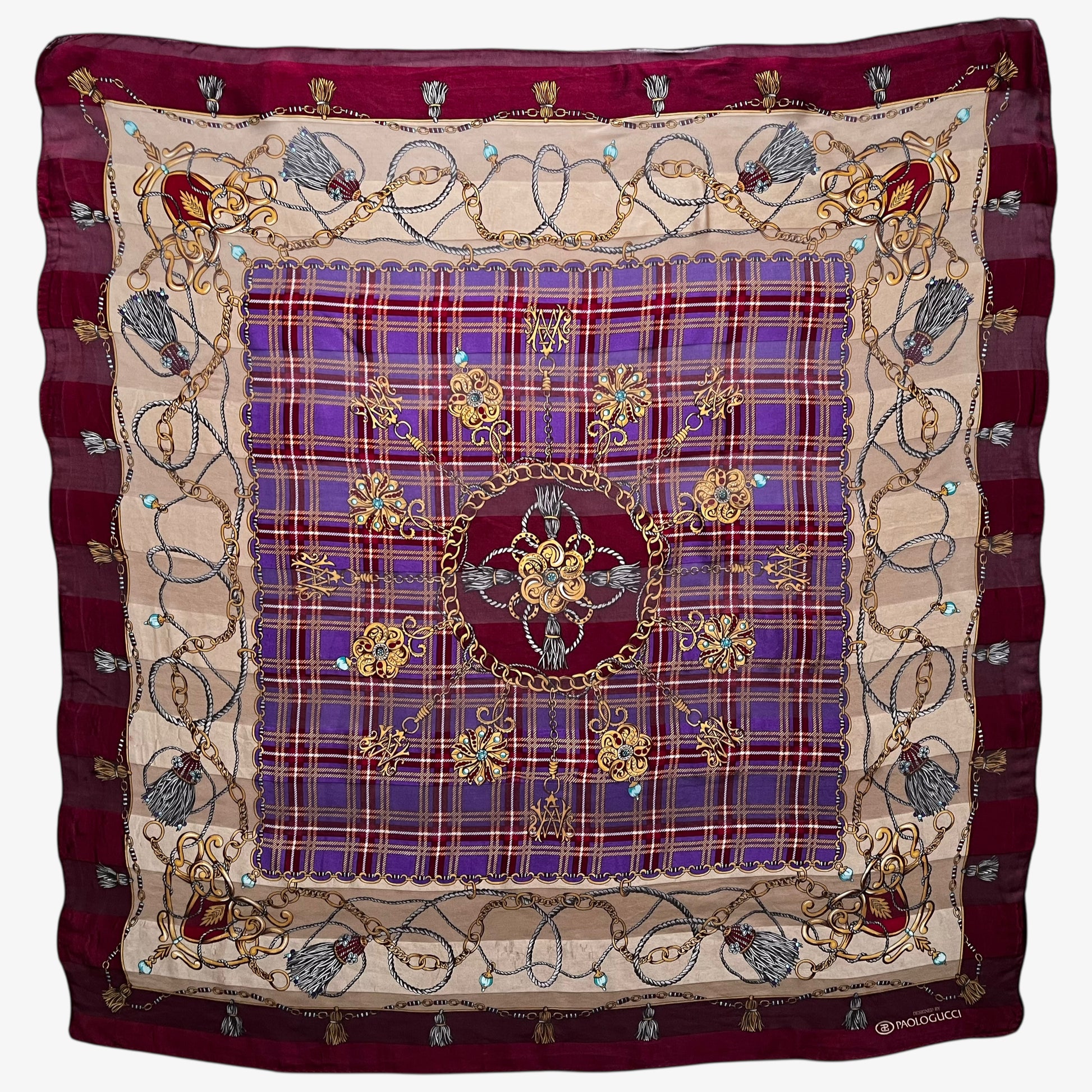Women's vintage 80s Paolo Gucci red silk scarf features a gold medallion chain and purple tartan print.