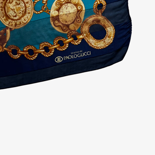 Paolo Gucci spell out logo on women's vintage 90s gold medallion chain print green and purple silk scarf.