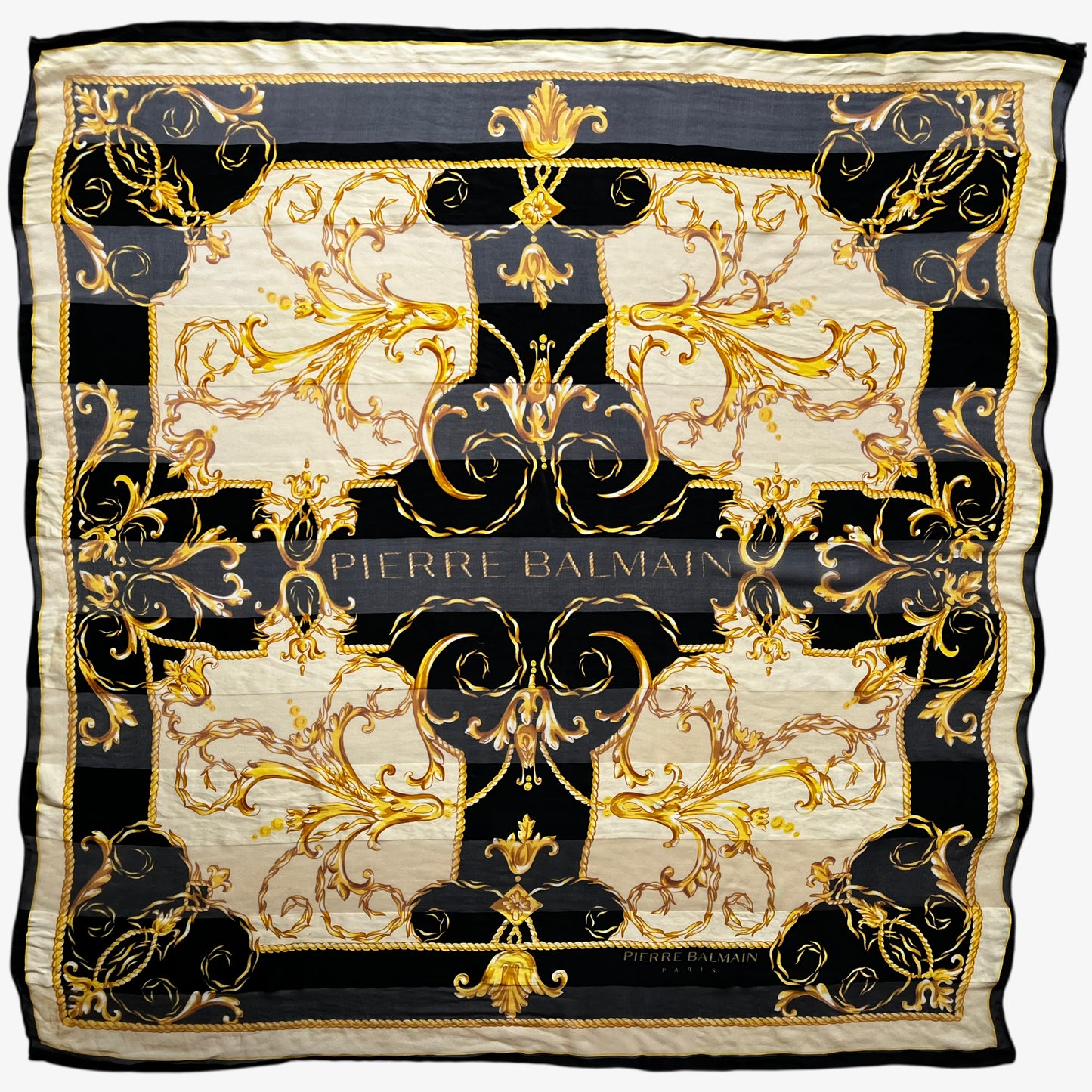 Vintage 80s women's Pierre Balmain gold baroque spell out print black silk scarf.