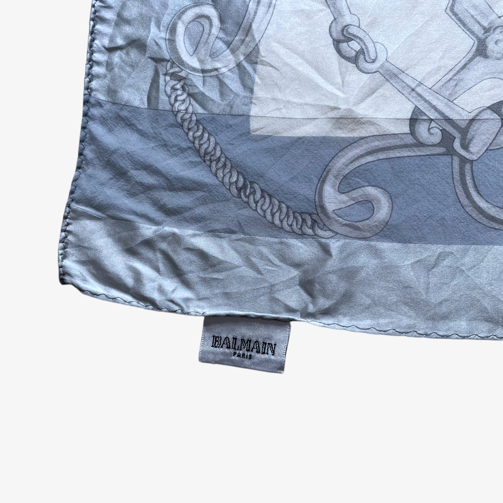 Balmain Paris label of women's vintage 90s geometric horsebit print blue silk scarf.