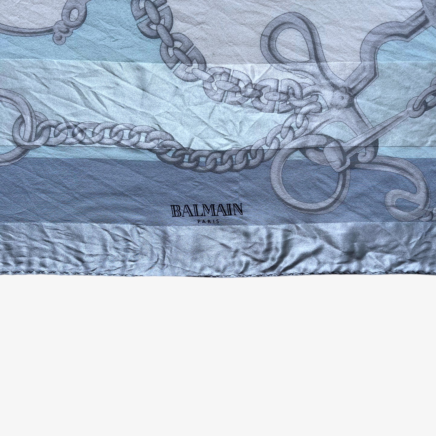 Balmain Paris spell out logo on women's vintage 90s geometric horsebit print blue silk scarf.