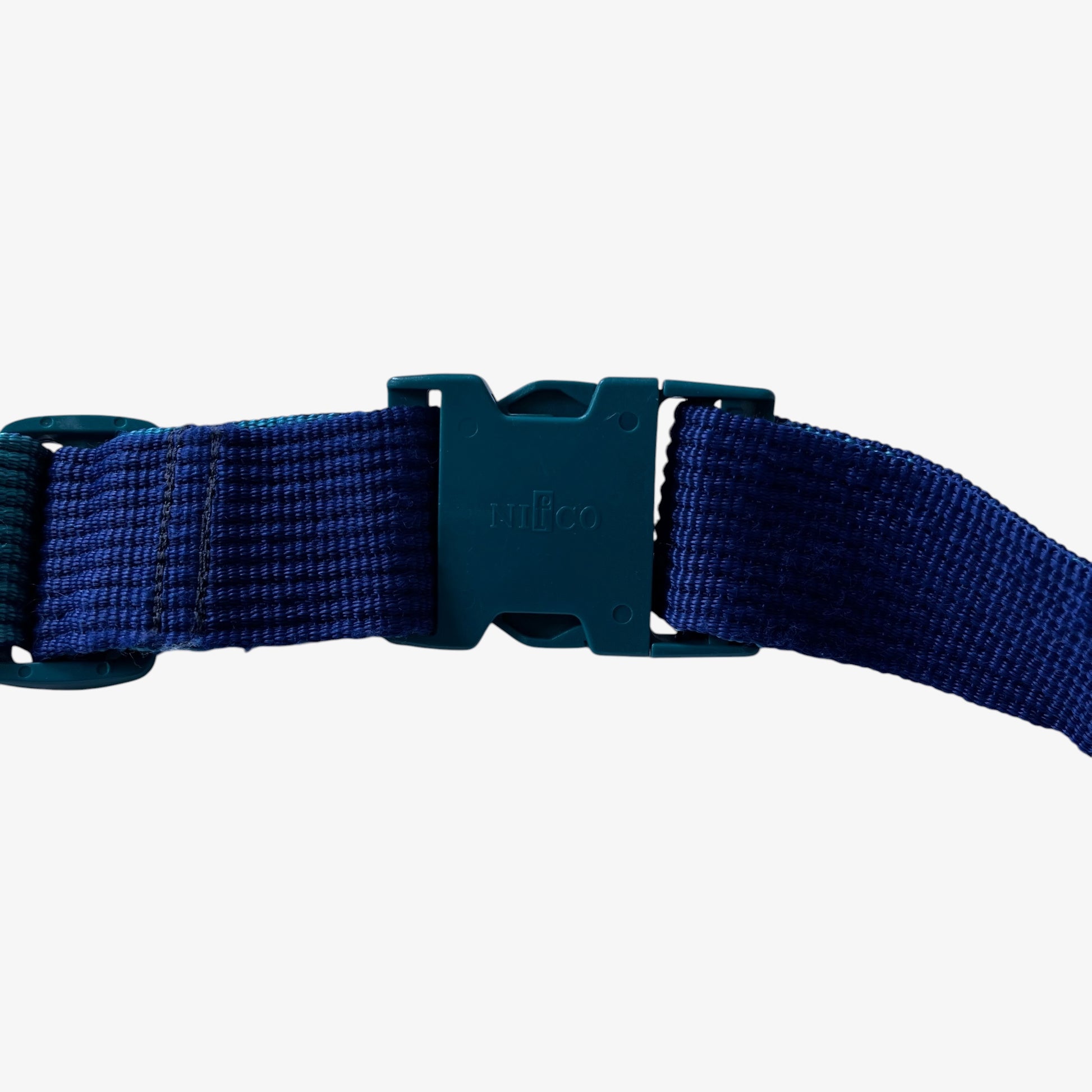 Blue strap of a vintage Salomon bum bag on a white background.
