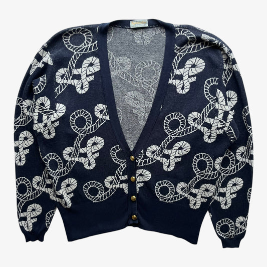 Vintage 80s women's Aquascutum navy nautical patterned cardigan with white pattern on a white background.