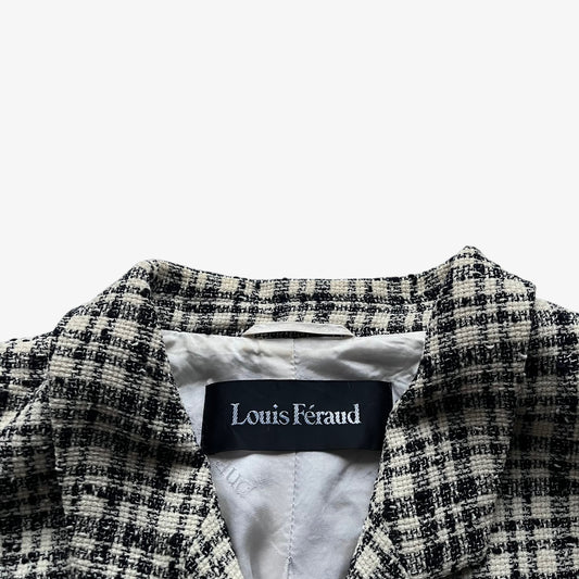 Louis Feraud label stitched inside of a women's vintage 80s cream and black striped tartan blazer.