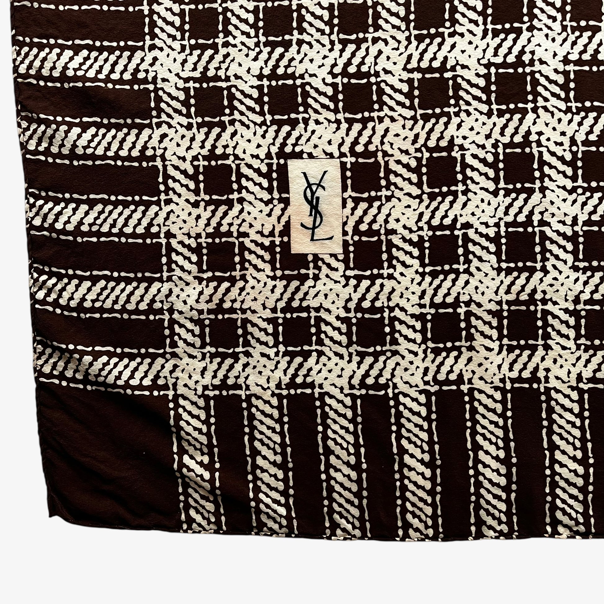 YSL motif on a women's vintage 80s Yves Saint Laurent brown checkered print silk scarf.