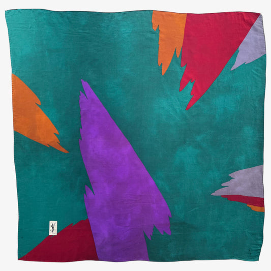 Colourful abstract print of women's vintage 80s Yves Saint Laurent green silk scarf.