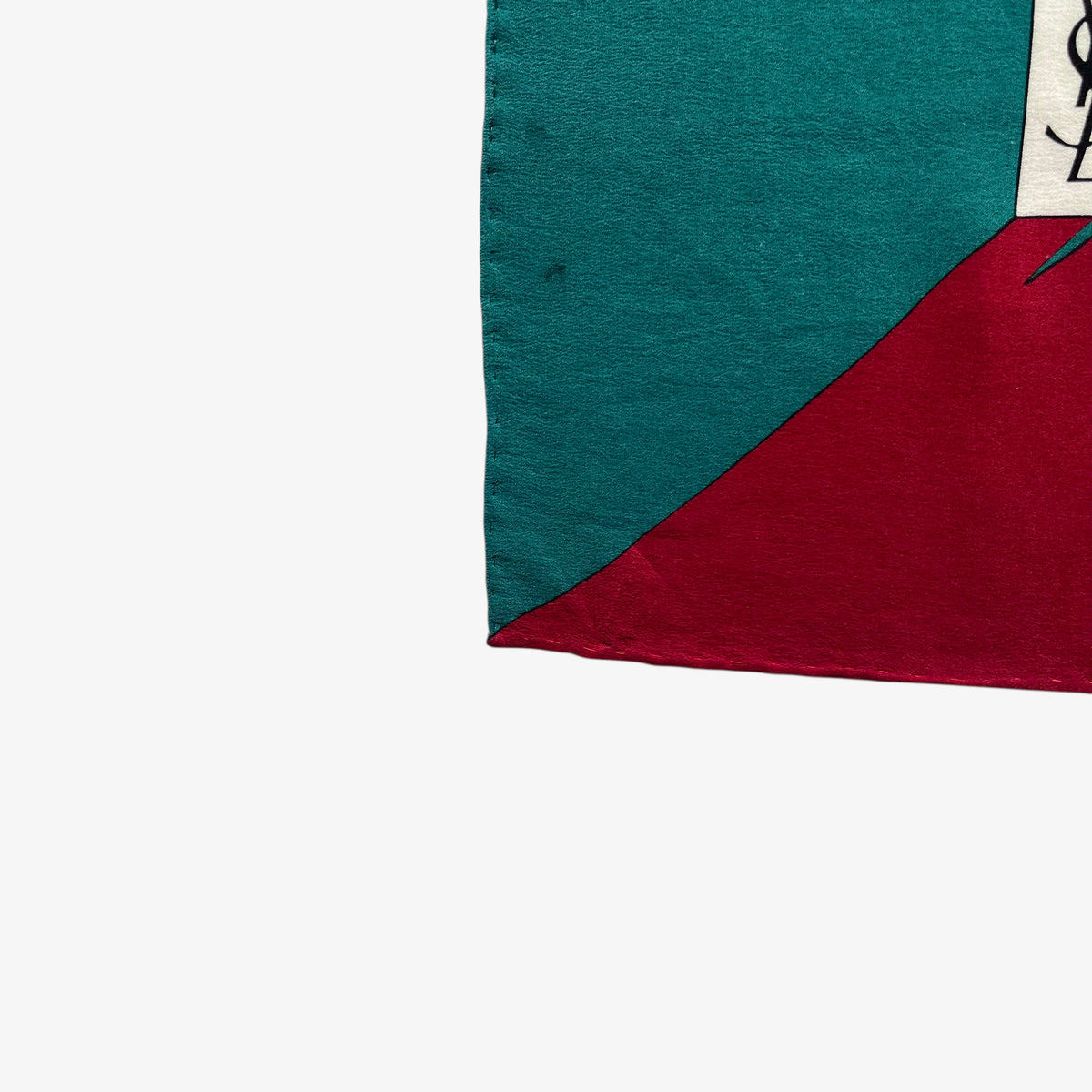Patina of women's vintage 80s Yves Saint Laurent colourful abstract print green silk scarf.