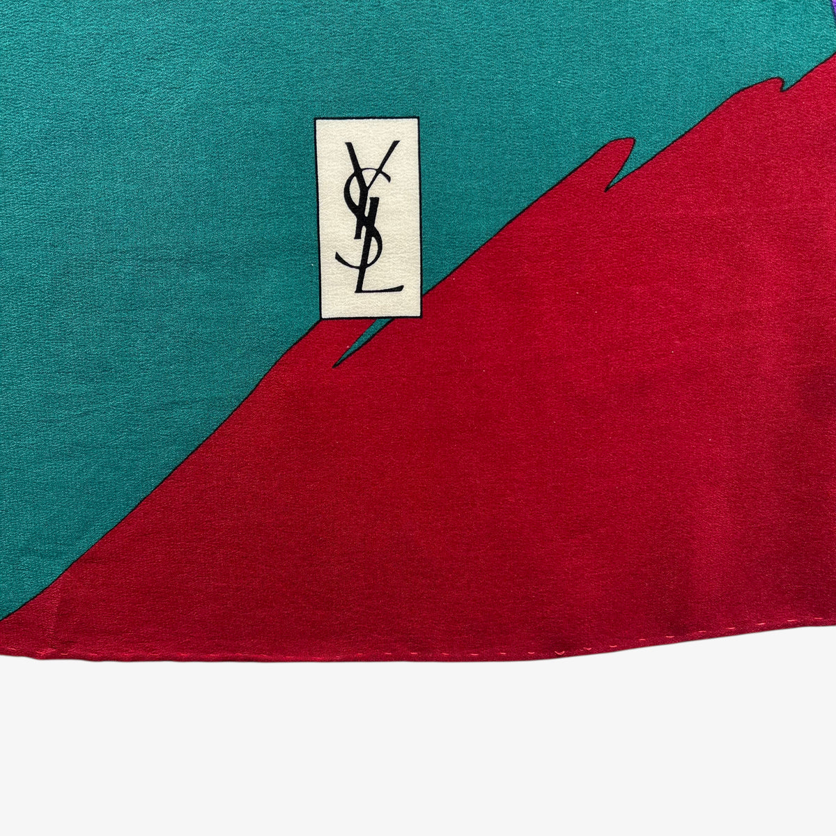 YSL motif of women's vintage 80s Yves Saint Laurent colourful abstract print green silk scarf.