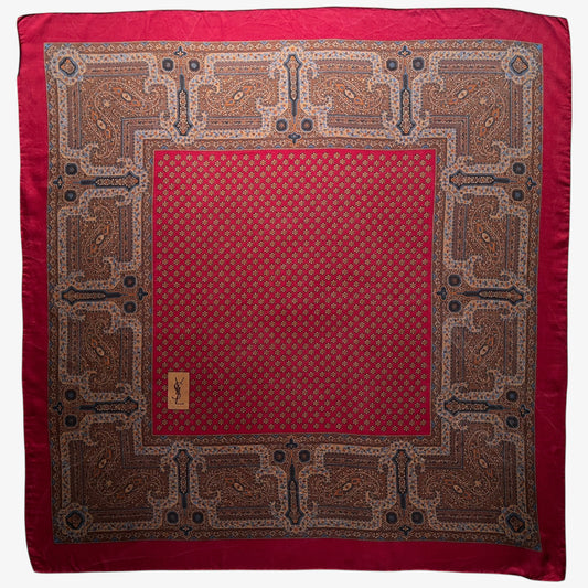 Women's vintage 80s Yves Saint Laurent foulards geometric paisley print red silk scarf with a big YSL logo.
