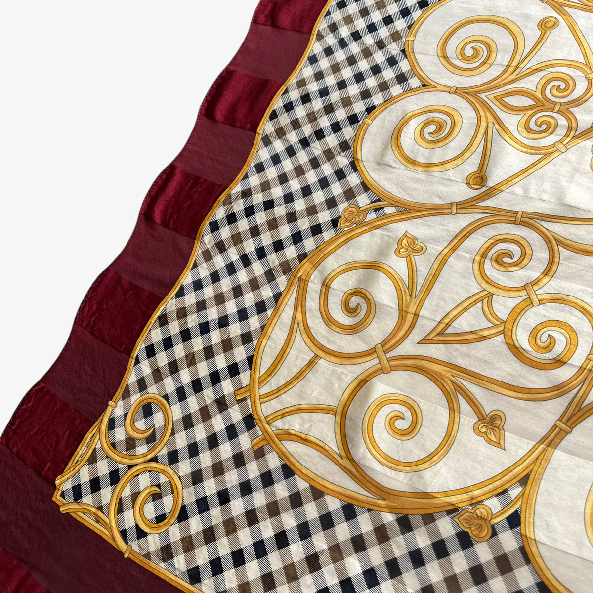 Discreet striped pattern on a women's vintage 90s Aquascutum of London colourful house checkered and baroque heart printed red silk scarf.