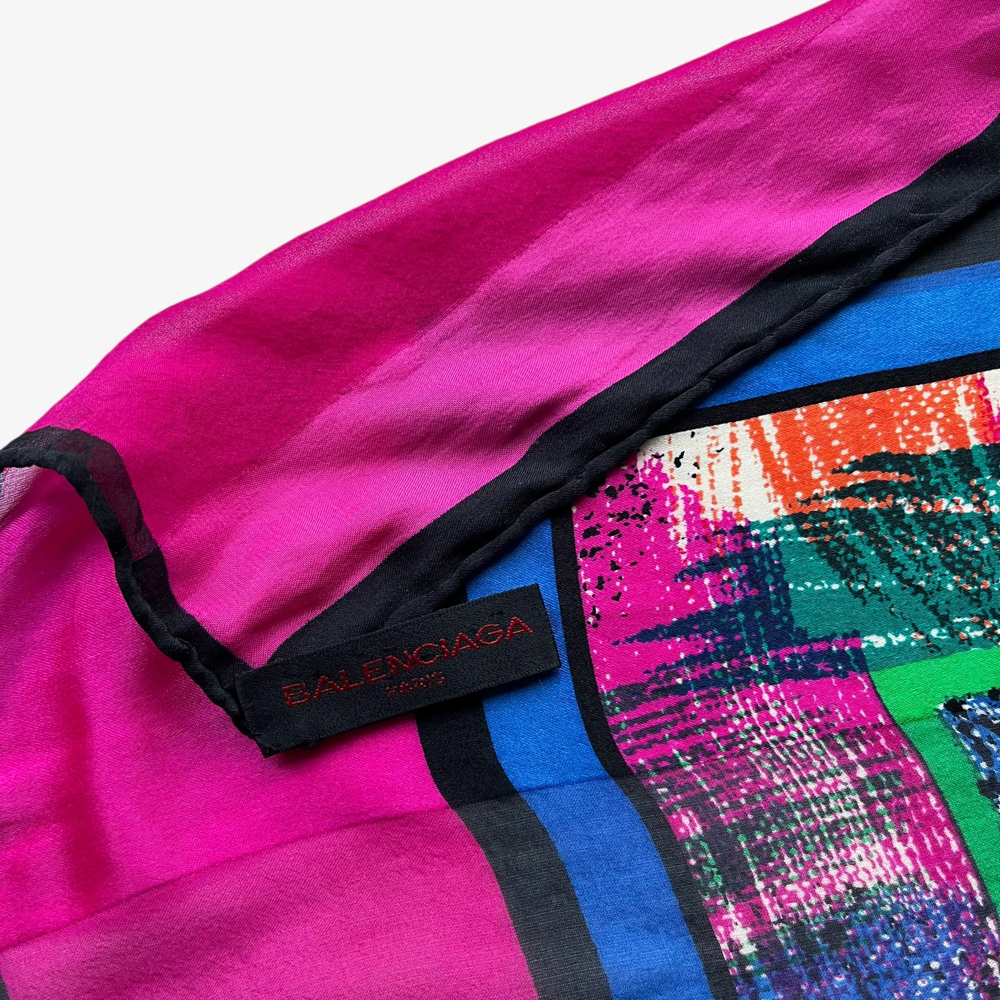 Balenciaga Paris label on vintage 90s women's abstract floral print pink and green silk scarf.