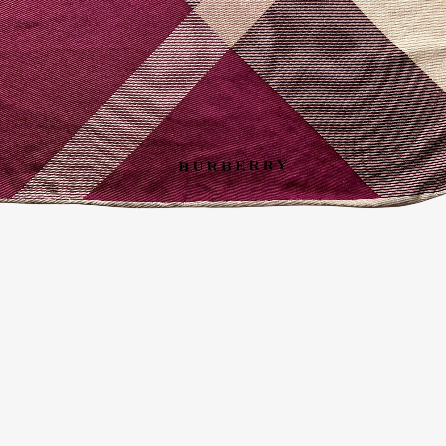 Burberry logo on women's vintage 90s Burberry purple nova check print silk scarf features a tartan design.