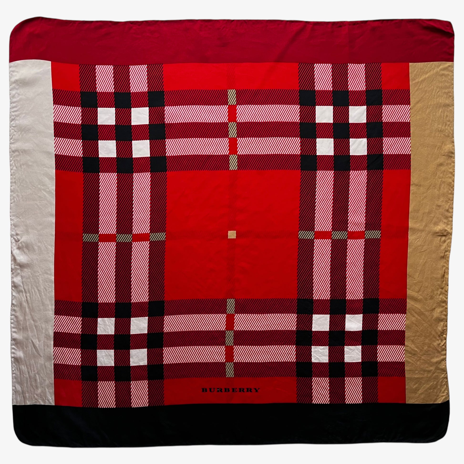 Vintage 90s women's Burberry red nova check print silk scarf featuring a colourful plaid tartan pattern.
