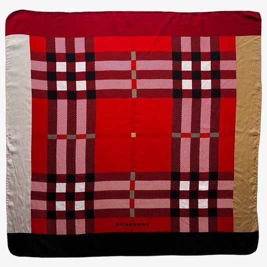 Vintage 90s women's Burberry red nova check print silk scarf featuring a colourful plaid tartan pattern.