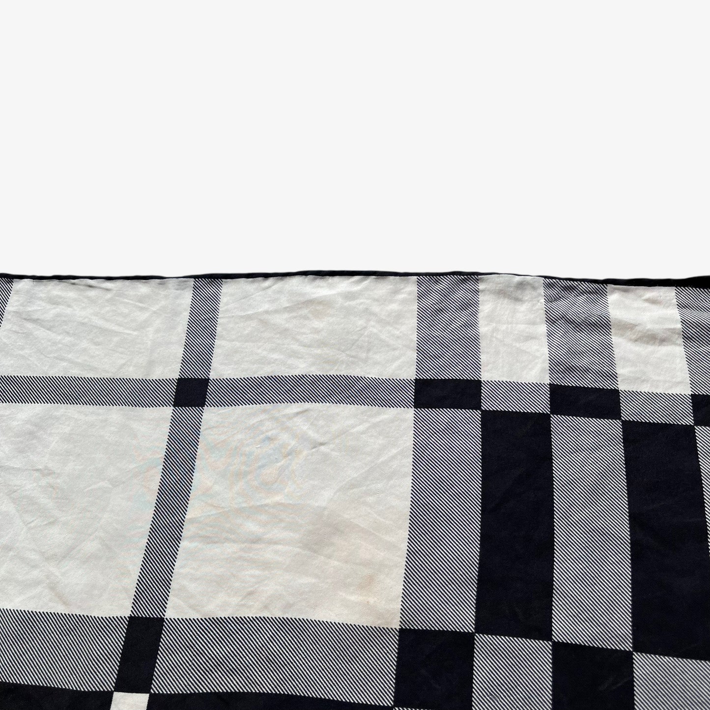 Patina on women's vintage 90s Burberry white and black nova check print silk scarf.