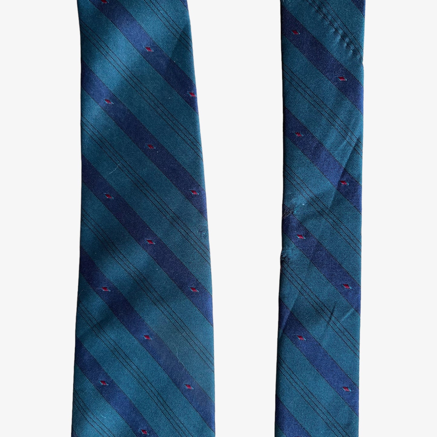 Wear on a vintage 90s Chaps Ralph Lauren green and blue striped silk blend tie.