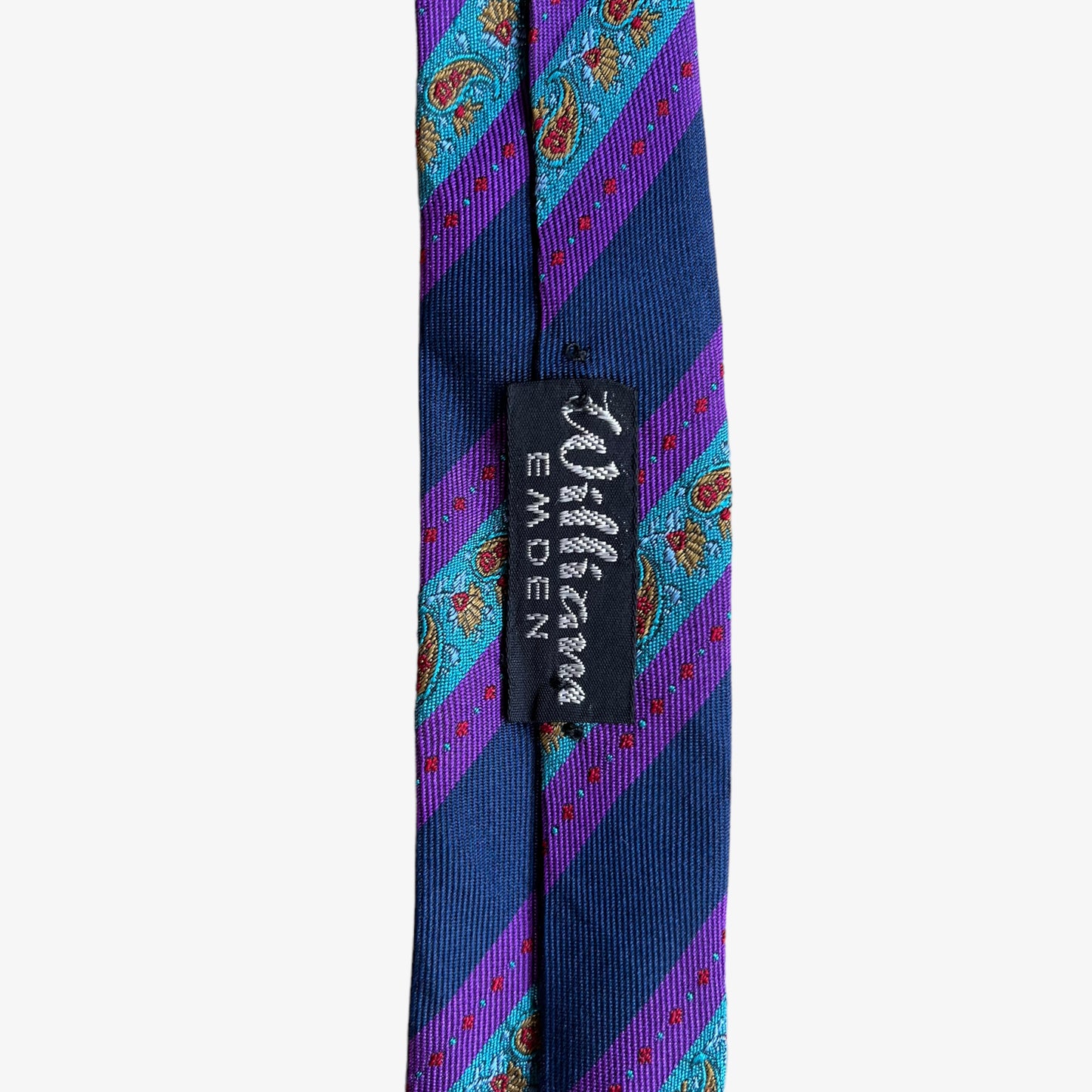 Tag of vintage 90s Ermenegildo Zegna paisley print striped silk tie.