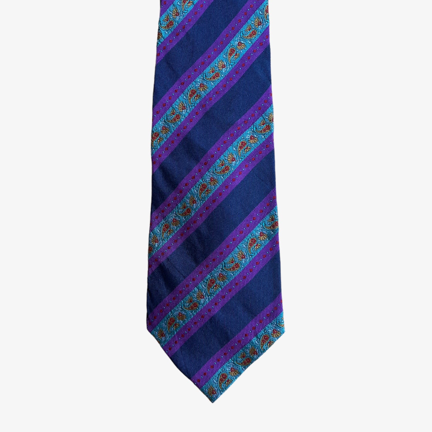 Tip of vintage 90s Ermenegildo Zegna paisley print striped silk tie.