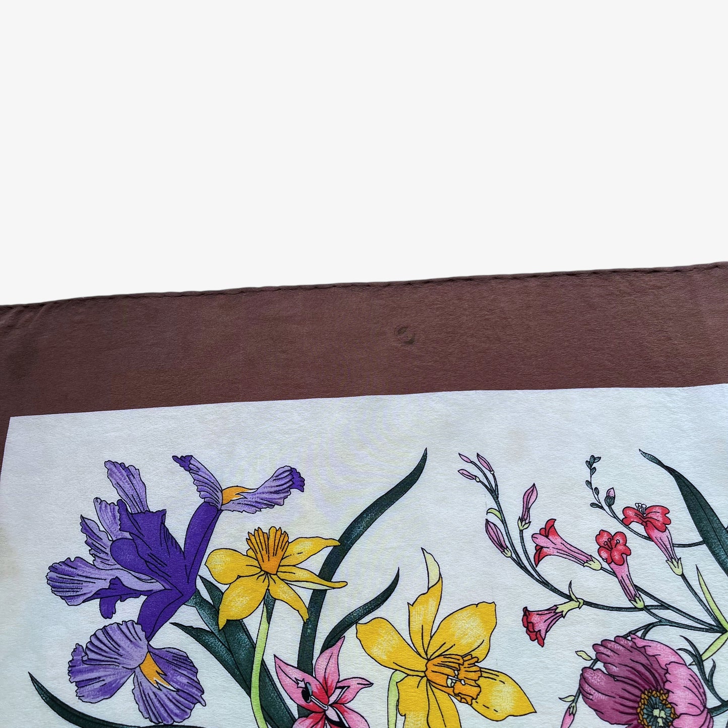 Wear on women's 90s vintage Gucci colourful floral and insect print brown silk scarf designed by Vittorio Accornero.