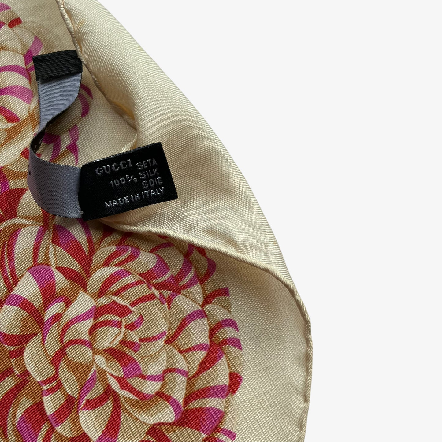 Made in Italy label of women's vintage 90s Gucci geometric patchwork checkered spell out print pink silk scarf.