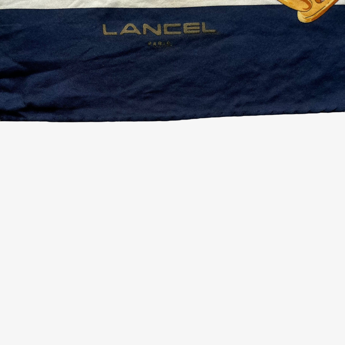 Lancel Paris spell out logo on women's vintage 90s gold equestrian horsebit print blue silk scarf featuring a striped design.