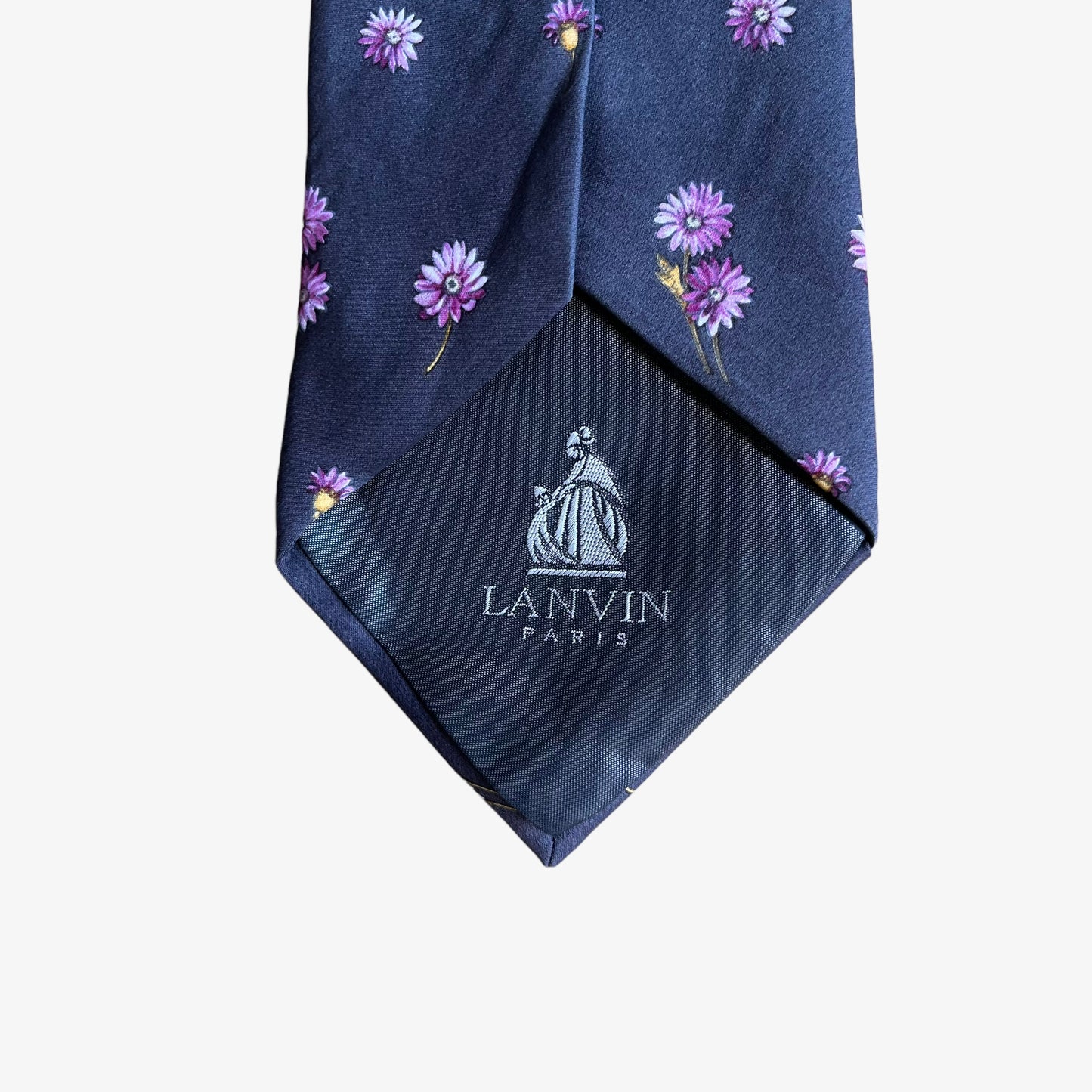 Back embroidered logo of vintage 90s Lanvin pink floral print silk tie.