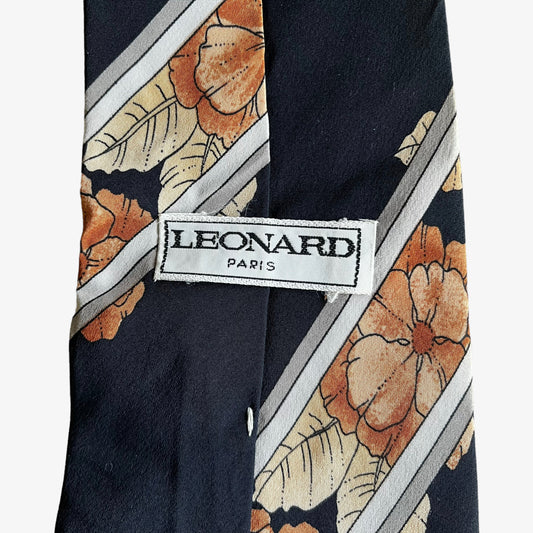 Label of vintage 90s Leonard striped floral print silk tie.