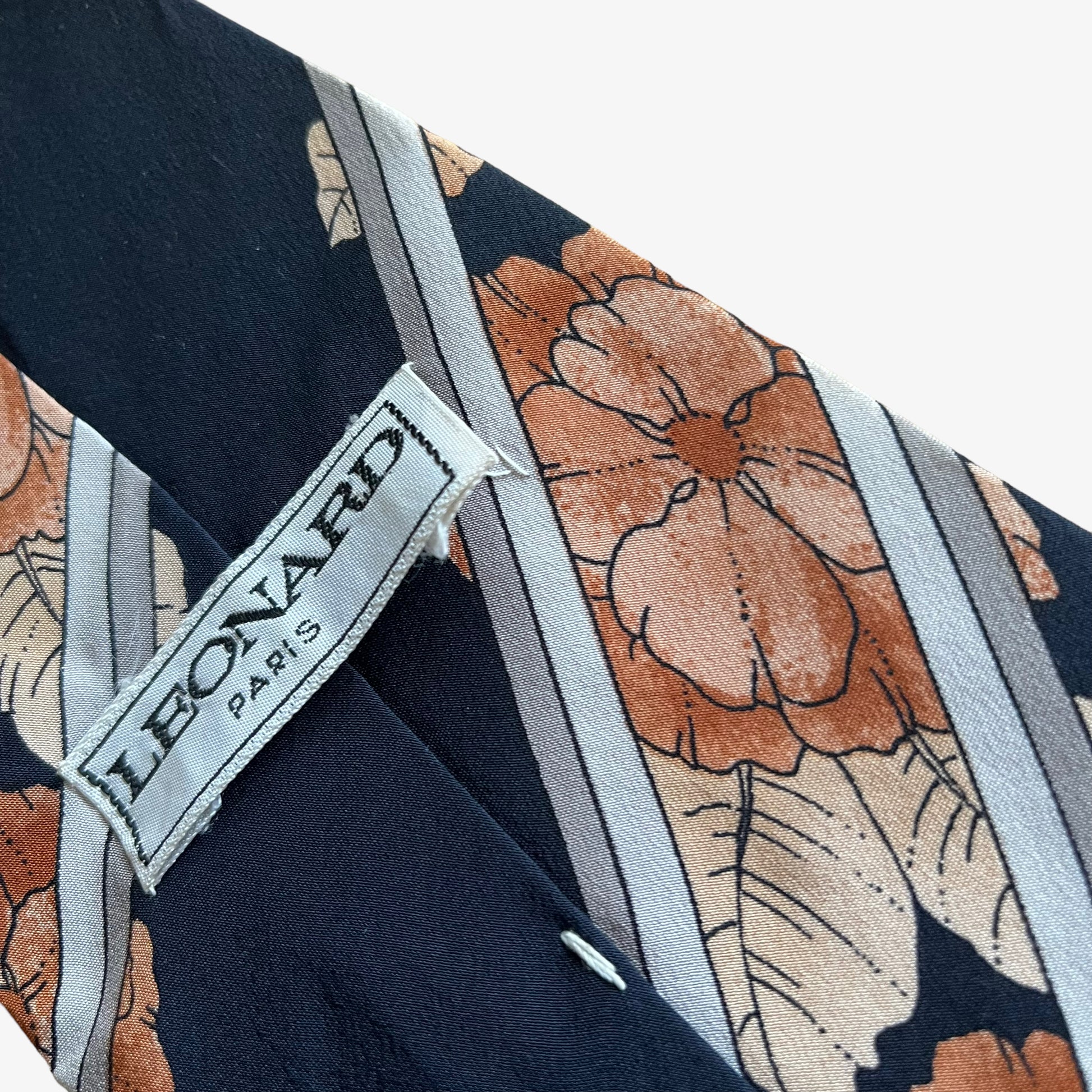 Patina on vintage 90s Leonard striped floral print silk tie.