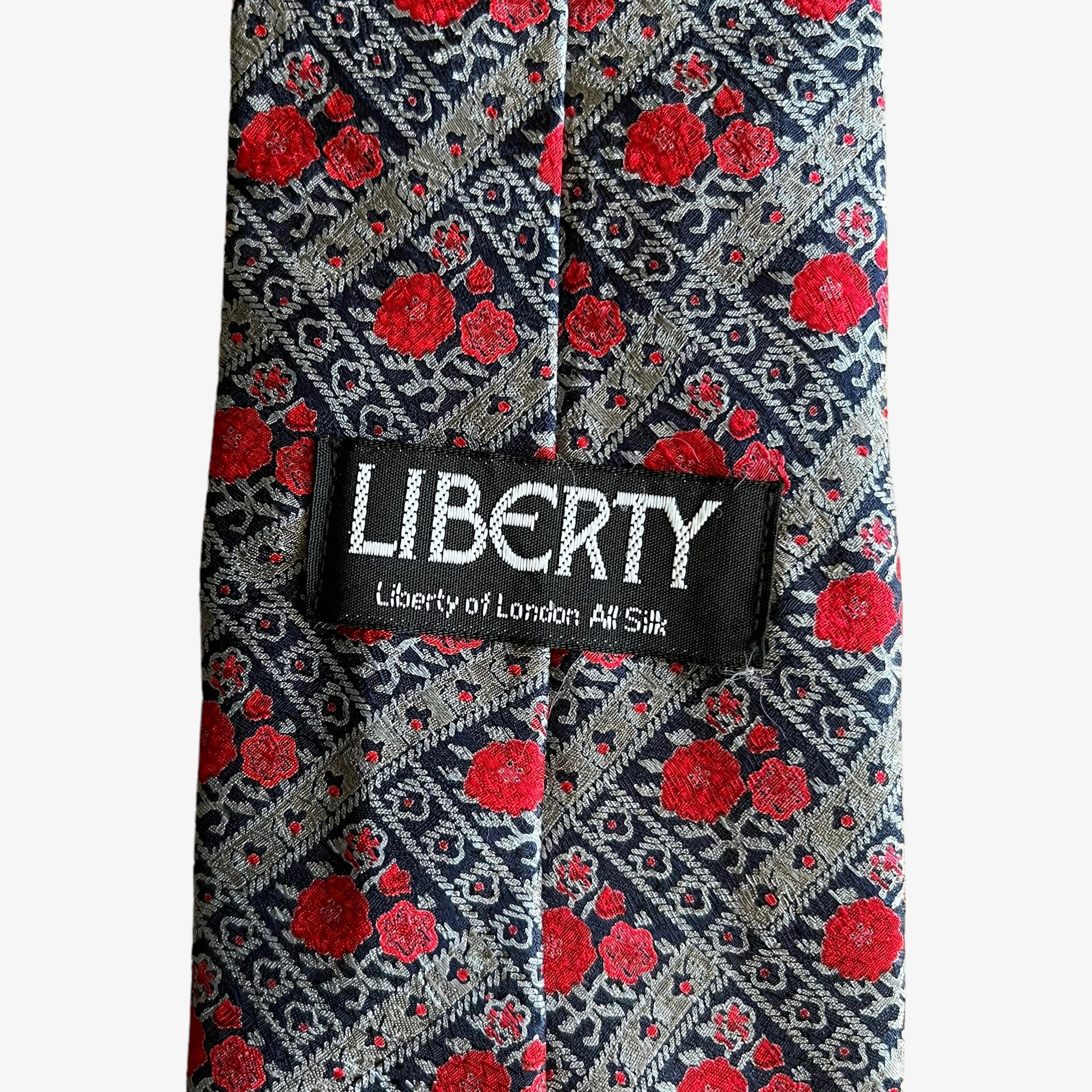 Vintage 90s Liberty of London floral print silk tie label.