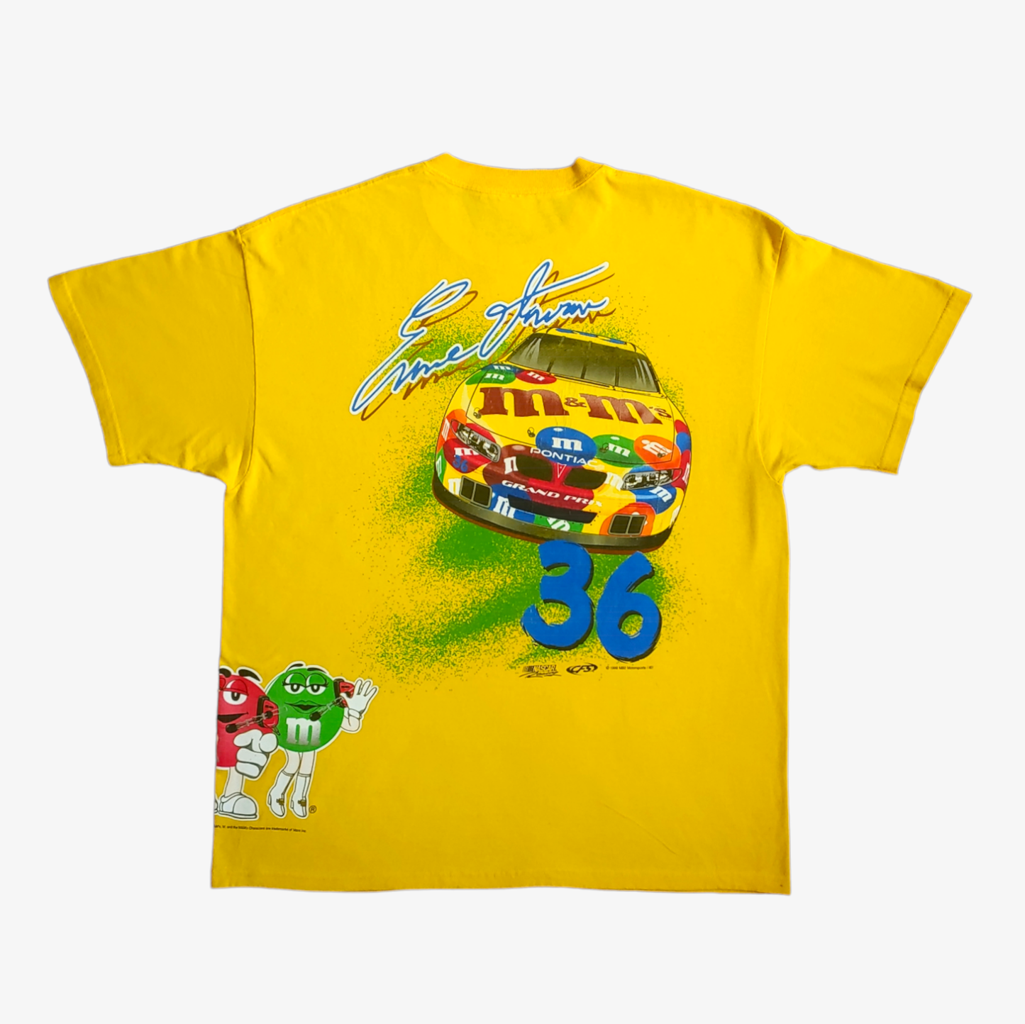 Back of vintage 90s Ernie Irvan M&M NASCAR racing team yellow t-shirt with double-sided all over print.