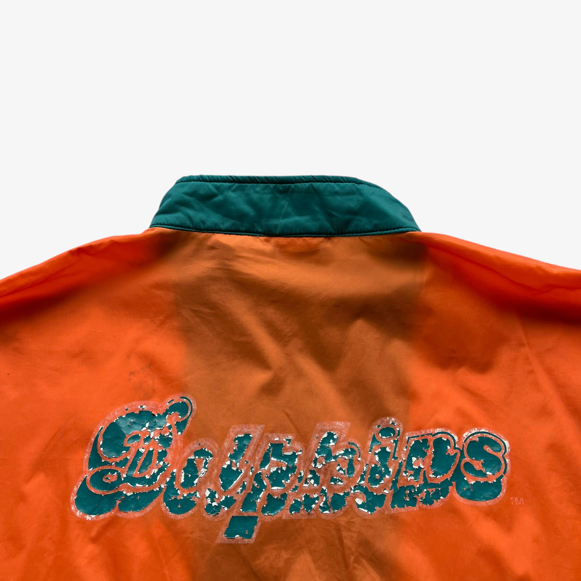 Back printed spell out on men's vintage 90s Apex One NFL Miami Dolphins jacket.