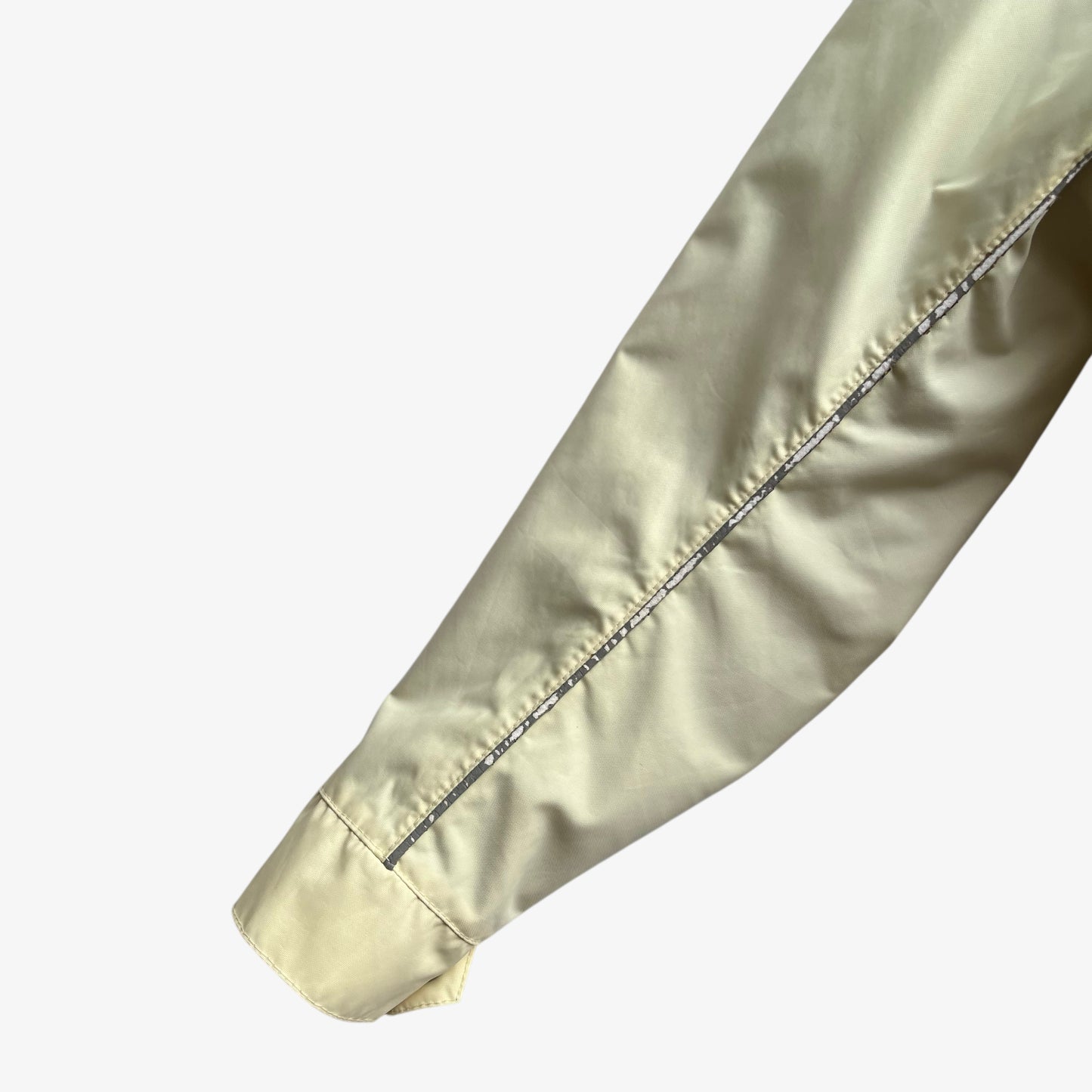 Arm of vintage 90s men's Belstaff tourmaster 500 cream biker jacket.