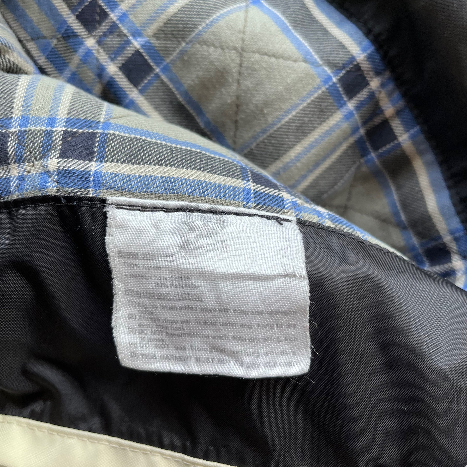 Inside label of vintage 90s men's Belstaff tourmaster 500 cream biker jacket.