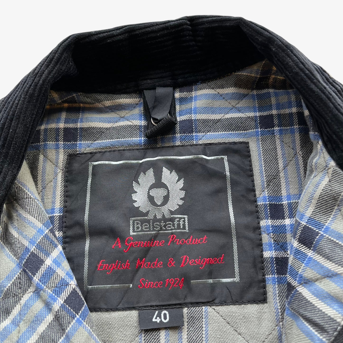 Belstaff label stitched inside of vintage 90s men's Belstaff tourmaster 500 cream biker jacket.