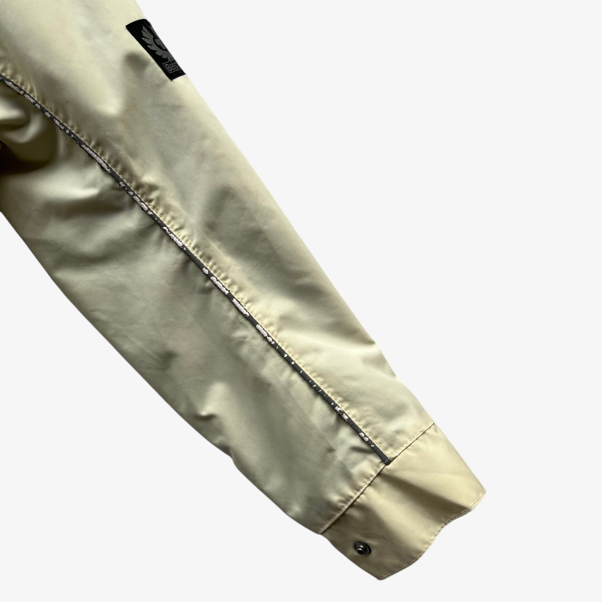 Sleeve of vintage 90s men's Belstaff tourmaster 500 cream biker jacket.