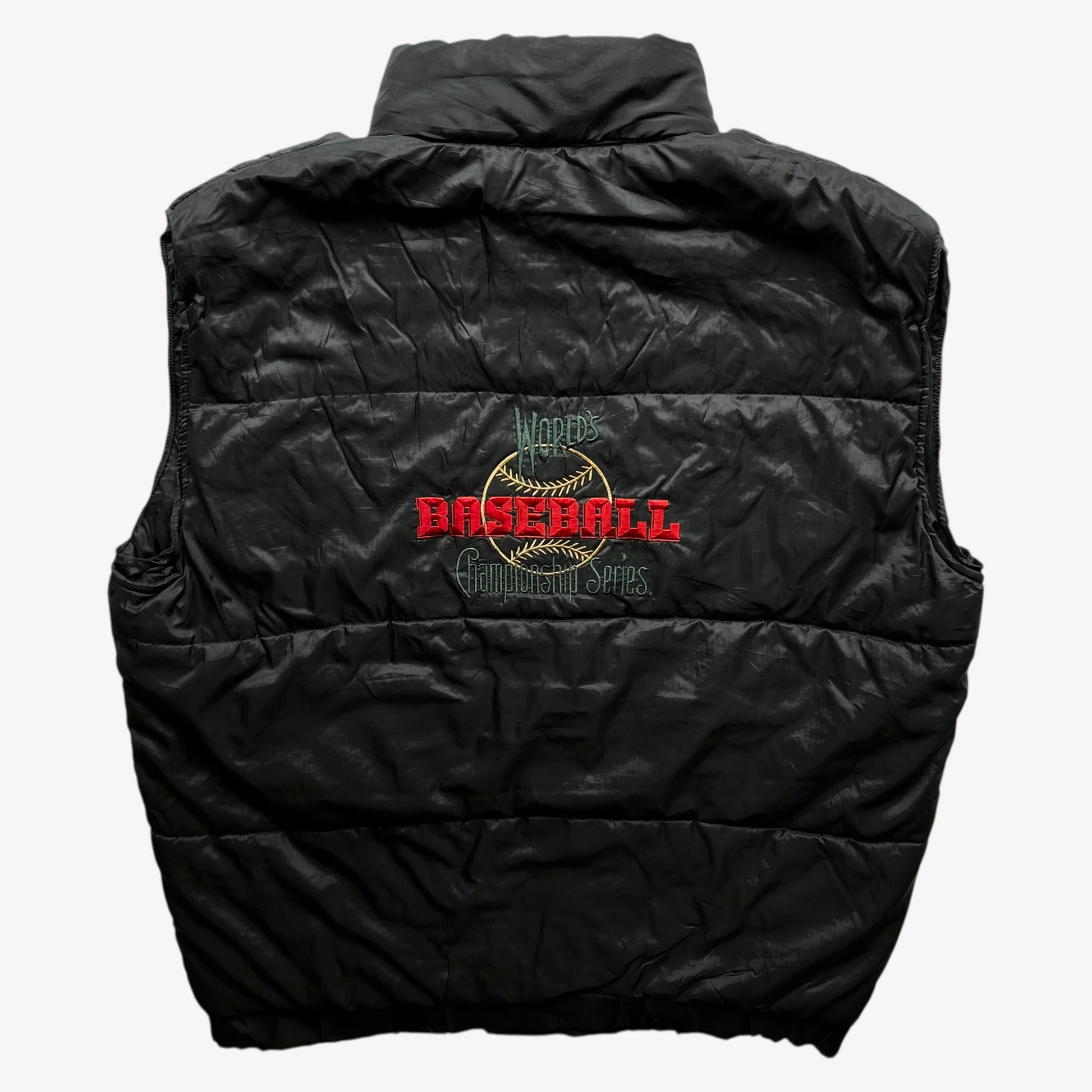 Back of vintage 90s men's Efro baseball world series championship black gilet with embroidered spell out.