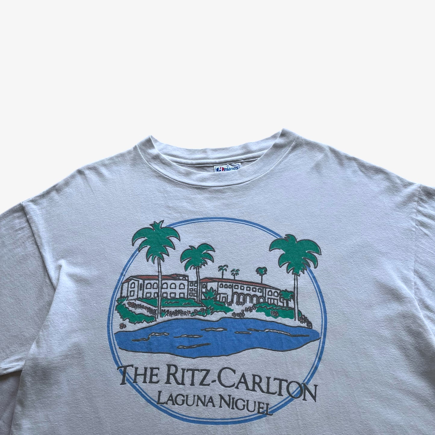Vintage 90s Mens Hanes Beefy Ritz Carlton Laguna Niguel Print Single Stitch T-Shirt Spell Out - Casspios Dream