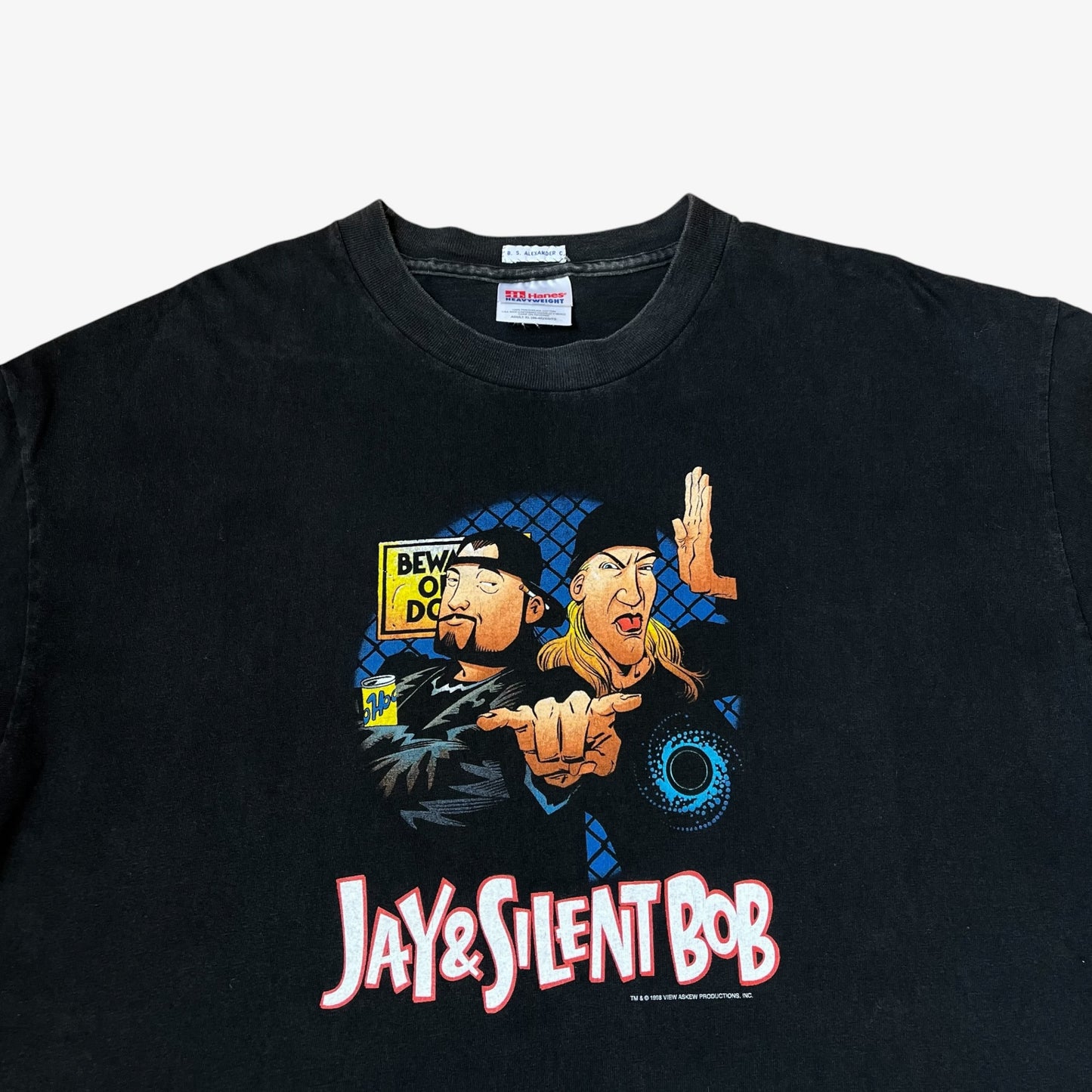 Close up of Jay and silent Bob 1998 print on a vintage 90s men's Hanes black t-shirt.