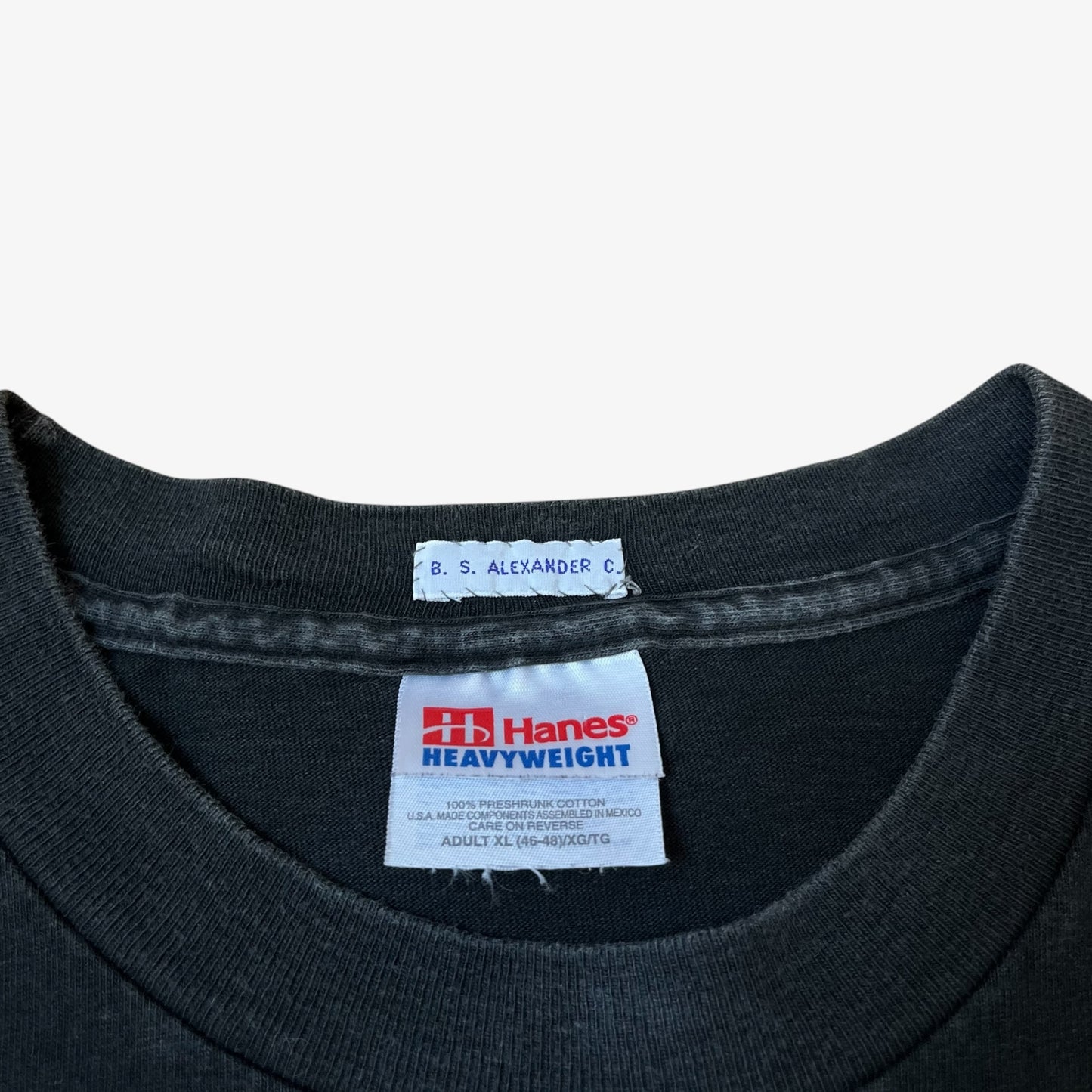 Hanes heavyweight label stitched inside of vintage 90s Jay and silent Bob 1998 print black t-shirt.