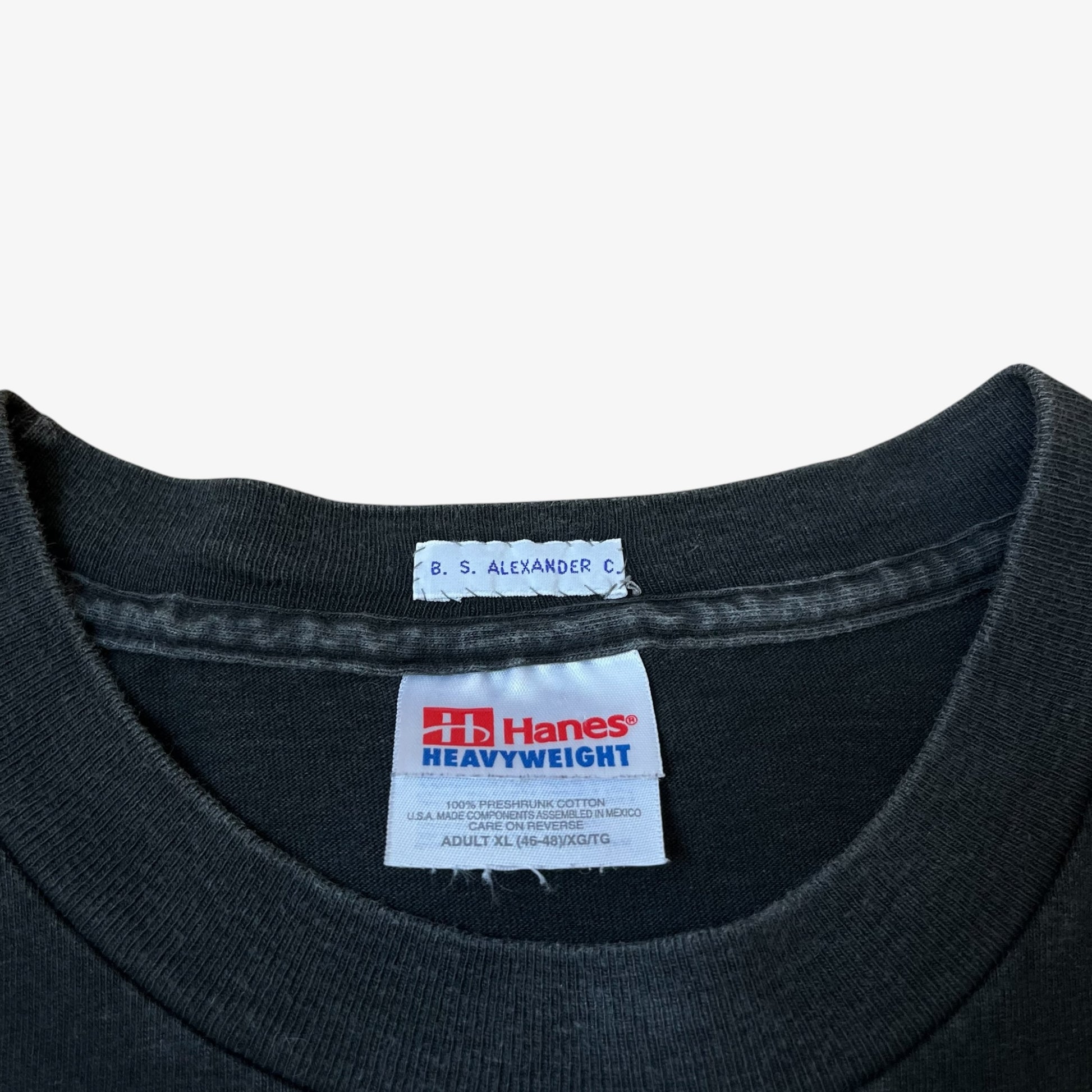 Hanes heavyweight label stitched inside of vintage 90s Jay and silent Bob 1998 print black t-shirt.