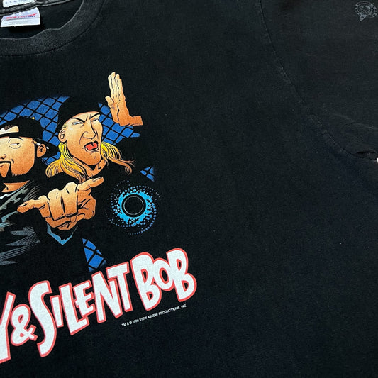 Close up of 1998 view askew productions inc print on vintage men's Hanes black t-shirt.