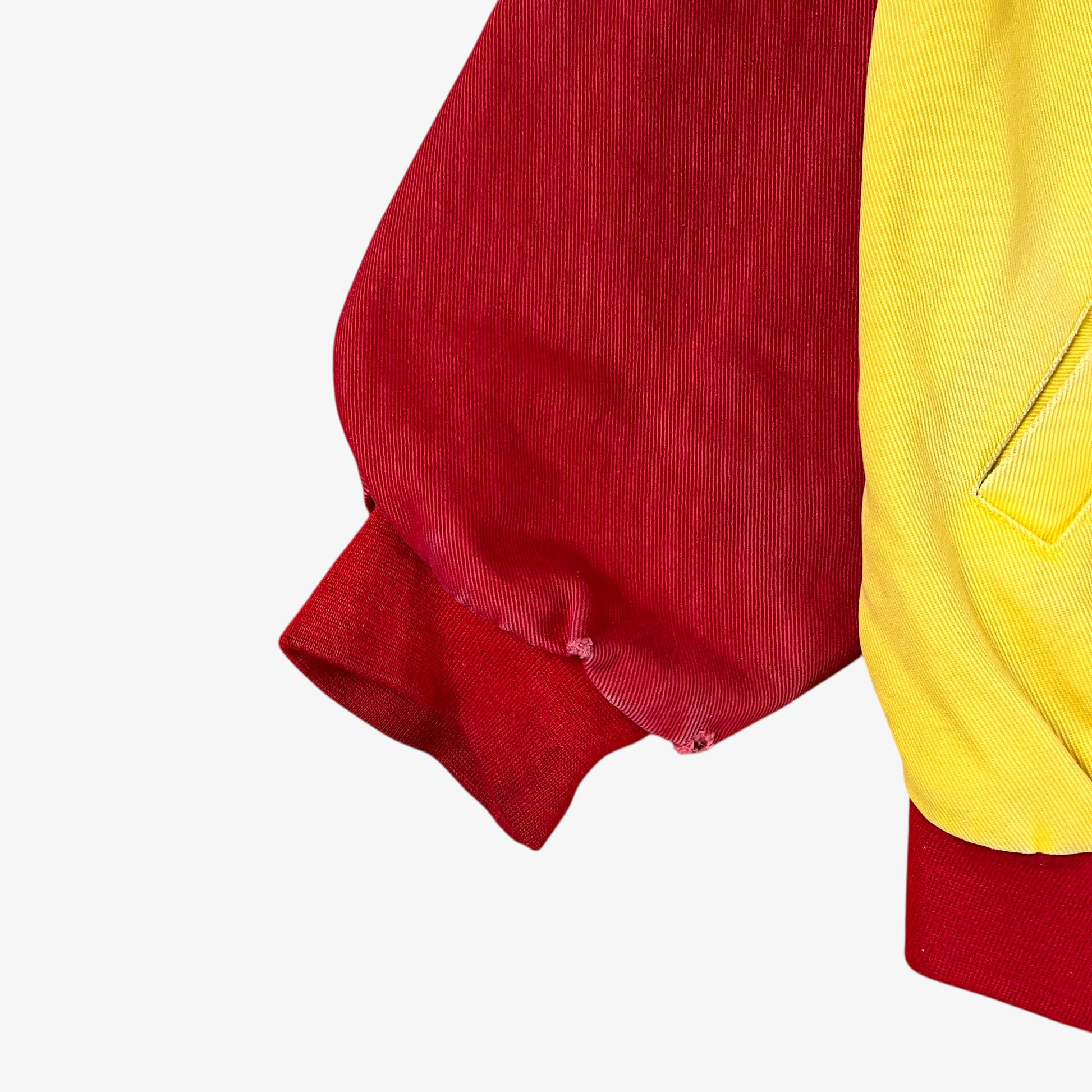 Scuff on vintage 90s Jeff Hamilton JH Design Ernie Irvan 36 M&M yellow NASCAR jacket.