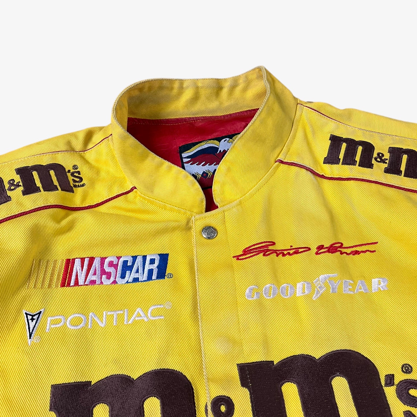 Goodyear sponsor on vintage 90s Jeff Hamilton JH Design Ernie Irvan 36 M&M yellow NASCAR jacket.