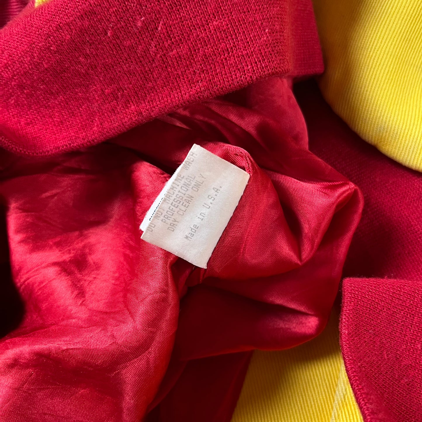 Made in USA label for vintage 90s Jeff Hamilton JH Design Ernie Irvan 36 M&M yellow NASCAR jacket.