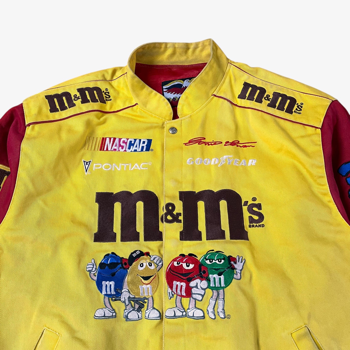 Close up of vintage 90s Jeff Hamilton JH Design Ernie Irvan 36 M&M yellow NASCAR jacket.