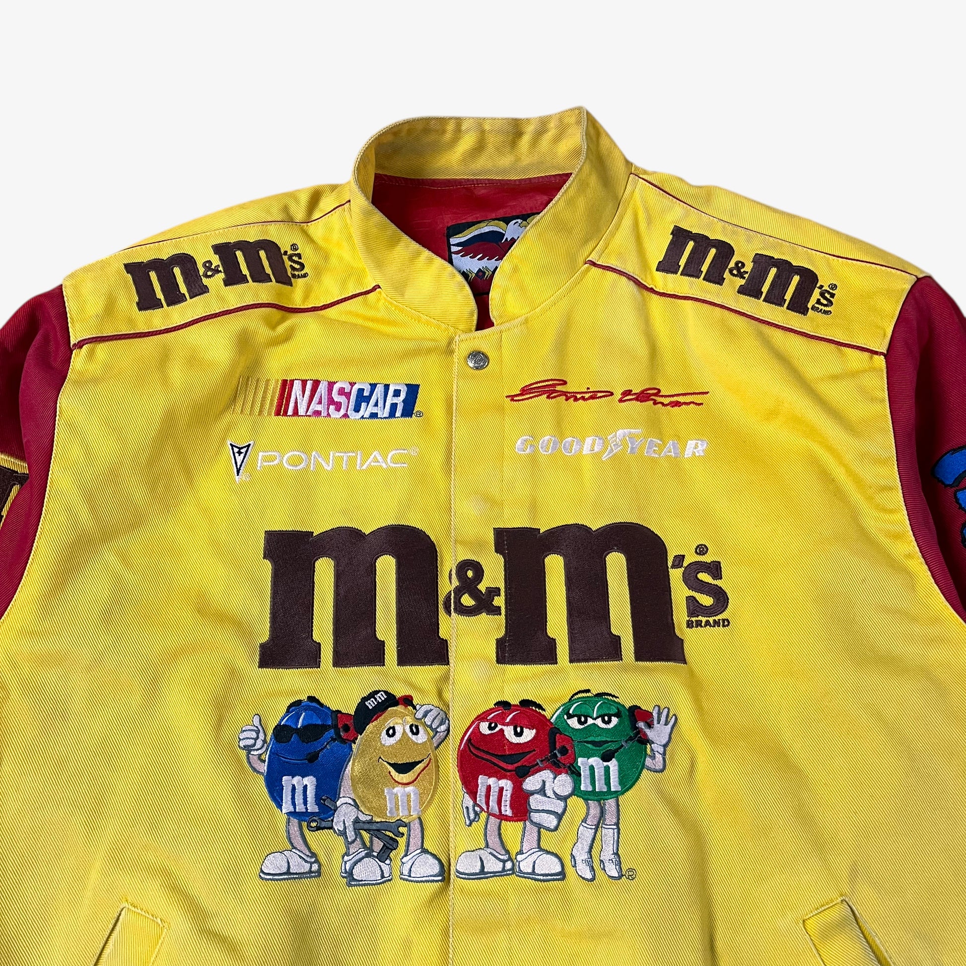 Close up of vintage 90s Jeff Hamilton JH Design Ernie Irvan 36 M&M yellow NASCAR jacket.